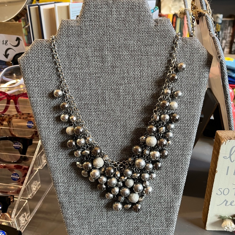 Silver necklace with baubles